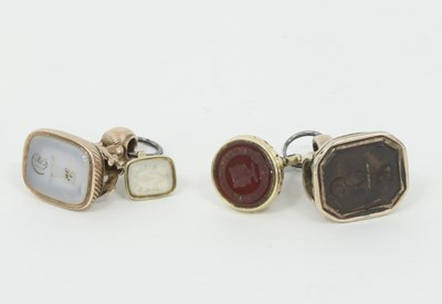 Lot 1162 - Four 19th Century fob seals, one with crest...