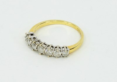 Lot 1195 - A diamond seven-stone ring set in gold