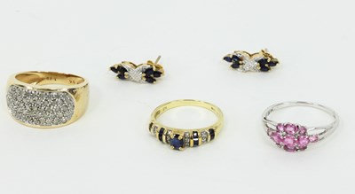 Lot 1197 - A diamond and sapphire ring, a pair of...