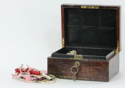 Lot 1205 - A large quantity of costume jewellery in a...