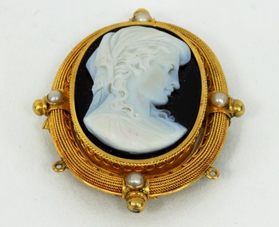 Lot 1211 - A French gold and hardstone cameo brooch, the...