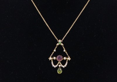 Lot 1224 - An Edwardian peridot, pink tourmaline and half...