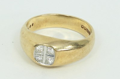 Lot 1235 - A 9ct gold and diamond ring, claw set with...