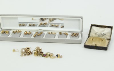 Lot 1254 - A large quantity of 9ct gold and other ear...