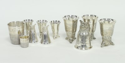 Lot 215 - A set of four 800 standard stirrup cups with...