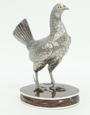 Lot 220 - A plated figure of a fighting cock on a wood...