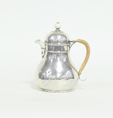 Lot 226 - A Queen Anne style silver jug, marks...