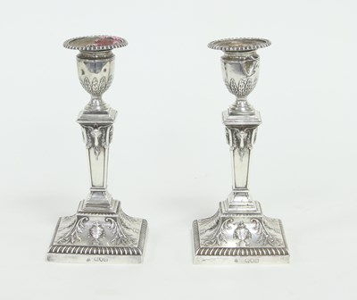 Lot 231 - A pair of silver candlesticks, London 1899, of...