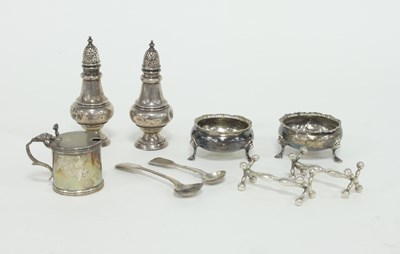 Lot 243 - A pair of silver pepper pots, Birmingham 1906,...