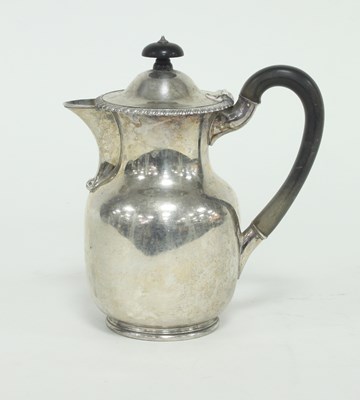 Lot 264 - A silver hot water jug, Sheffield 1908, fitted...