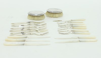 Lot 270 - A set of six silver fruit knives and forks...