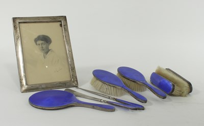 Lot 277 - A silver and blue enamel backed dressing set,...