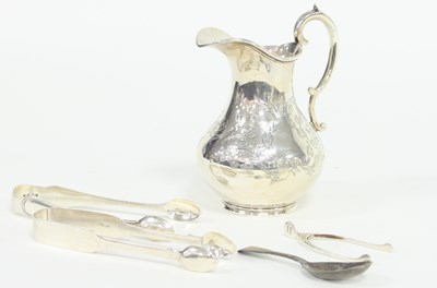 Lot 278 - A Victorian silver jug, London 1865, with...