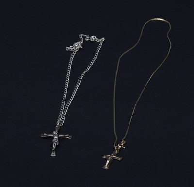 Lot 291 - A 9ct gold crucifix with neck chain and...