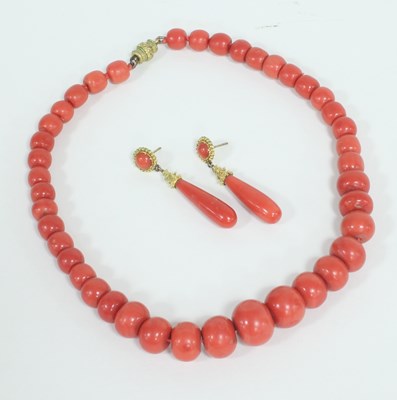 Lot 306 - A coral necklace of graduating beads, 41cm...