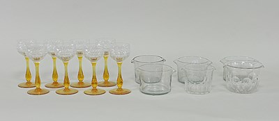 Lot 341 - A set of eight wine glasses with panelled...