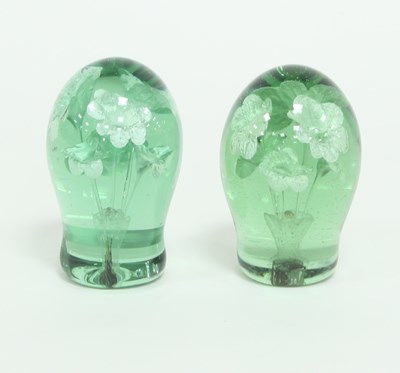 Lot 350 - A pair of green glass dumps