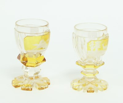 Lot 353 - A near pair of Bohemian glass goblets with...