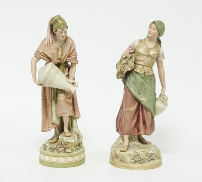 Lot 375 - Two Royal Dux figures, the pitcher bearers,...