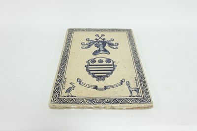 Lot 382 - An Arts and Crafts style armorial tile, dated...