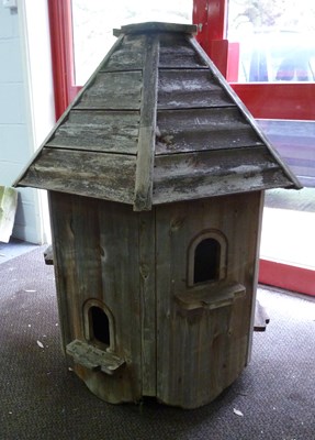 Lot 503 - A pine dovecote on a large pine column, 318cm...