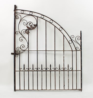 Lot 509 - A pair of iron gates with leaf decoration,...