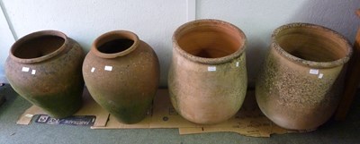 Lot 511 - A pair of terracotta pots, 62cm high and two...