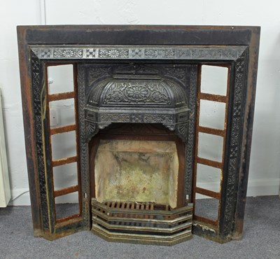 Lot 525 - A cast iron fire surround, No 69 Rg No 118029,...