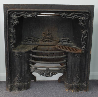 Lot 526 - A cast iron fire surround and grate, chased...