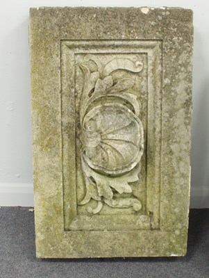 Lot 528 - A carved stone overmantel, the centre carved...