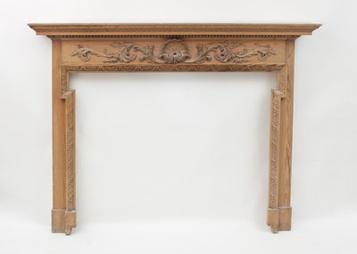 Lot 536 - A George III style pine fire surround with...