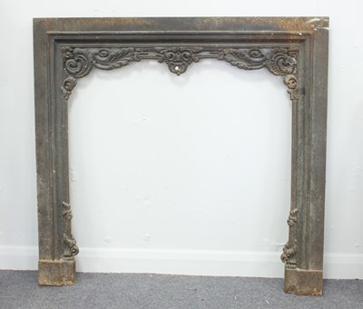 Lot 537 - A steel fire surround with leaf scroll...