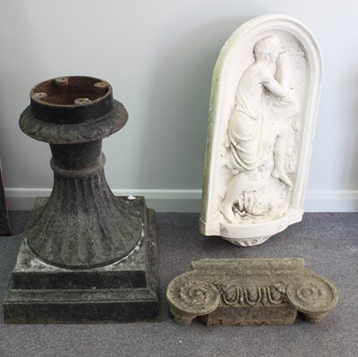 Lot 549 - A cast iron socle and base, an Ionic...