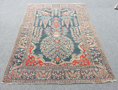 Lot 571 - A Kashan prayer rug, the central field with...