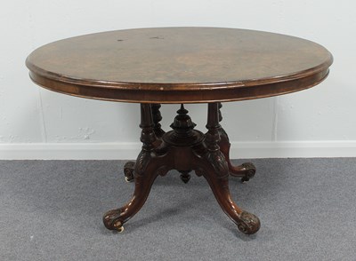 Lot 595 - A Victorian walnut veneered loo table with...