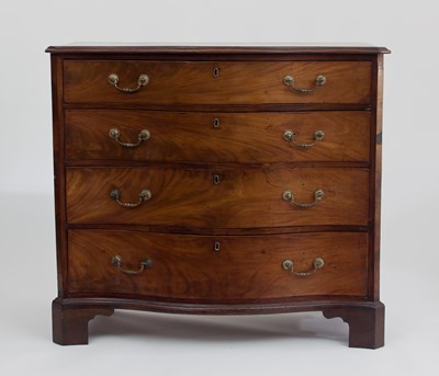 Lot 612 - A Georgian mahogany serpentine chest of...