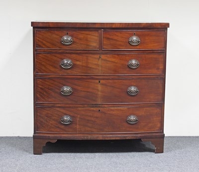 Lot 627 - A 19th Century bow fronted chest of two short...