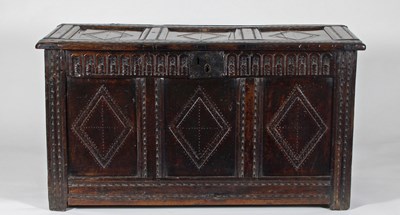 Lot 642 - A late 17th Century oak coffer carved diapers...