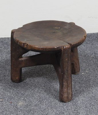 Lot 643 - A Tanzanian native stool, 24cm diameter