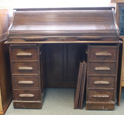 Lot 654 - An American roll-top desk, 122cm wide