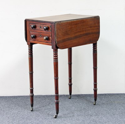 Lot 655 - A George IV mahogany two-flap table, fitted...