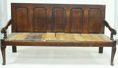 Lot 657 - An 18th Century oak settle with five fielded...