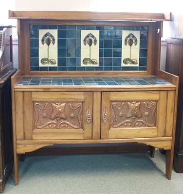 Lot 659 - An Art Nouveau yew wood washstand, with blue...