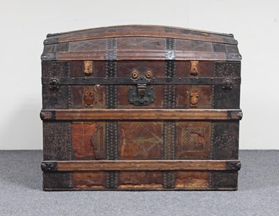 Lot 670 - A metal bound, wooden slatted and domed top...