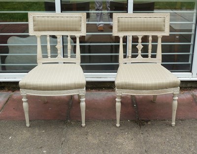 Lot 679 - A pair of Swedish dining chairs with...