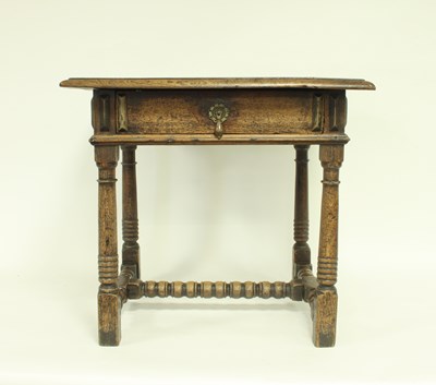 Lot 684 - A 17th Century oak table base with later top,...