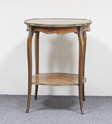 Lot 699 - A circular two-tier table of Louis XVI design,...