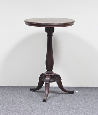 Lot 700 - A Regency mahogany tripod table on a turned...