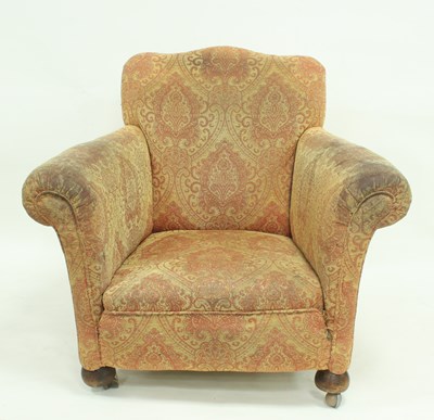 Lot 710 - An upholstered armchair