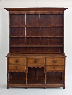 Lot 711 - A 19th Century oak dresser, the closed rack on...